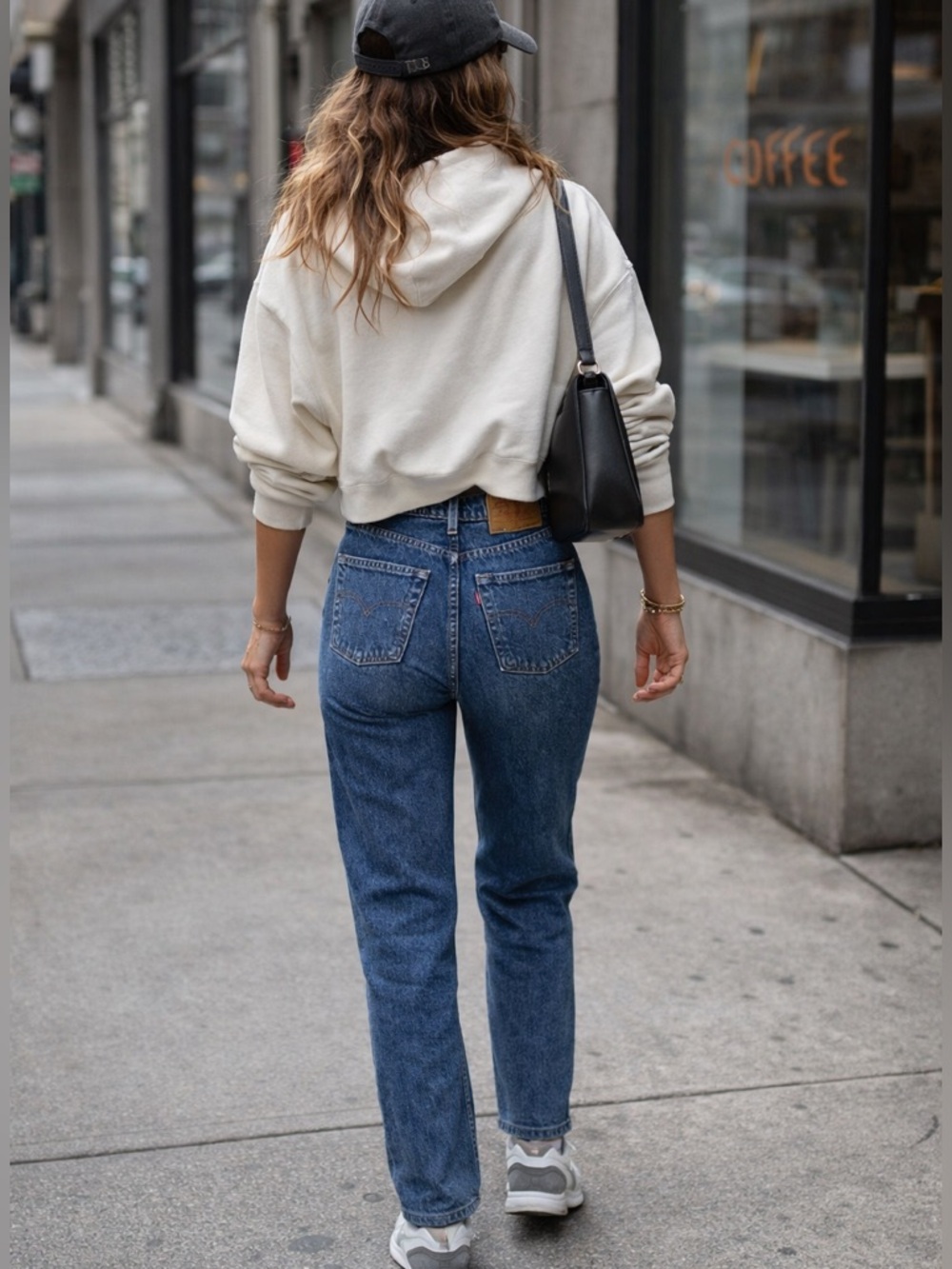 Vintage 90s Levi’s 553 straight leg high waist blue jeans with a pinch waist